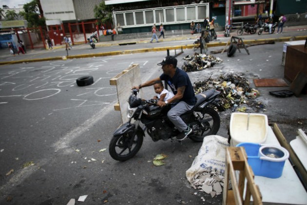AP Photo/Ariana Cubillos