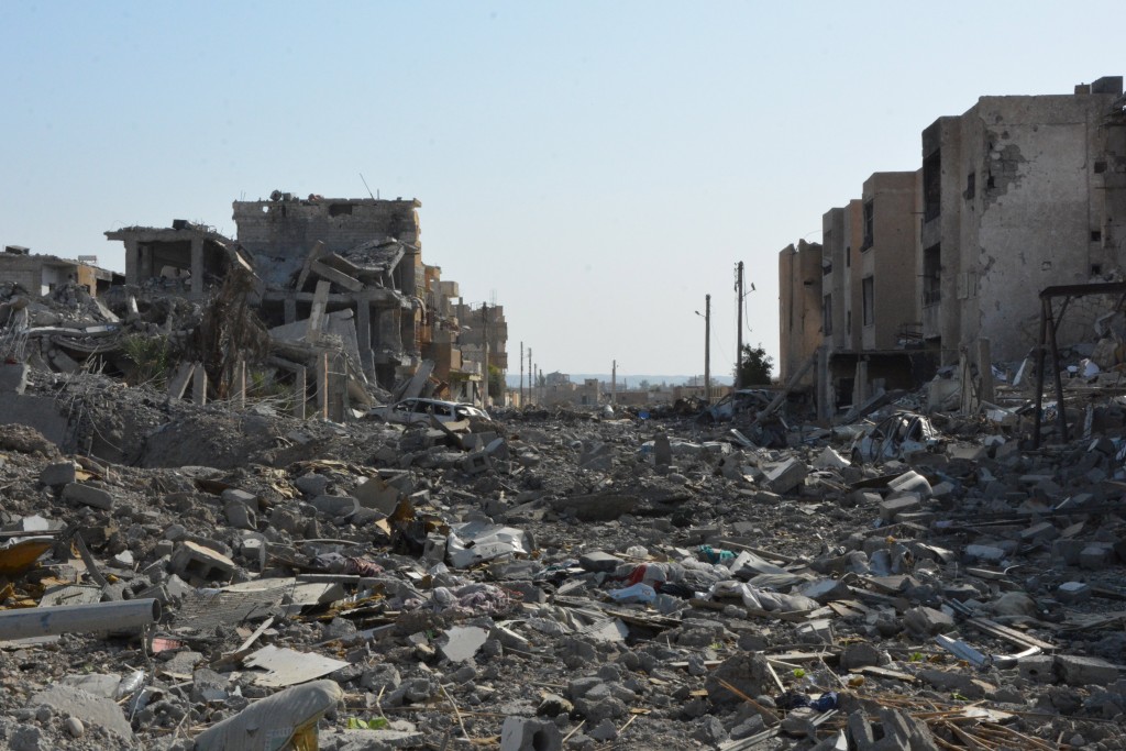 epa06284523 Damaged buildings are seen after fighters from Syrian Democratic Forces (SDF) took control of Raqqa, Syria, 22 October 2017 (issued 23 October 2017). Media reports on 22 October said Russia accused the coalition of heavily bombing Raqqa in the fight against the IS. The US-backed Syrian Democratic Forces announced on 18 October they have seized the majority of the Syrian northeastern city of al-Raqqa concluding a campaign that began on 06 June to liberate the city, former capital of the caliphate self-proclaimed by the IS terror organization in 2014. EPA/YOUSSEF RABIH YOUSSEF